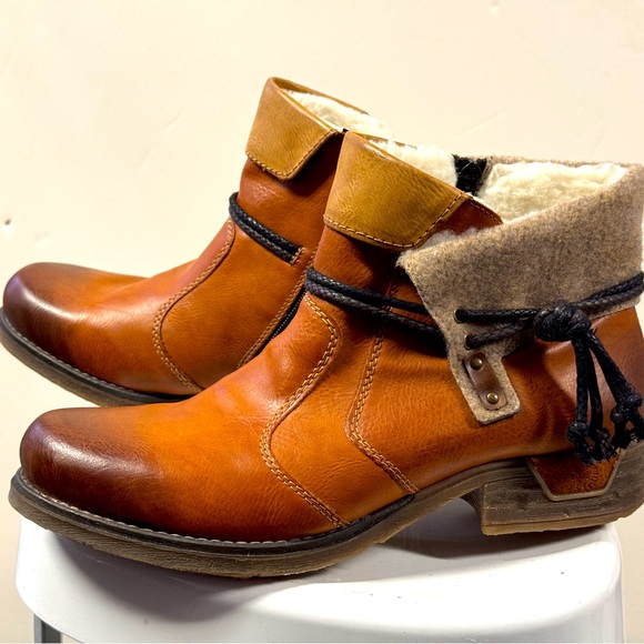 Rieker Shoes - Rieker women boots brown in color size 42 new without original box